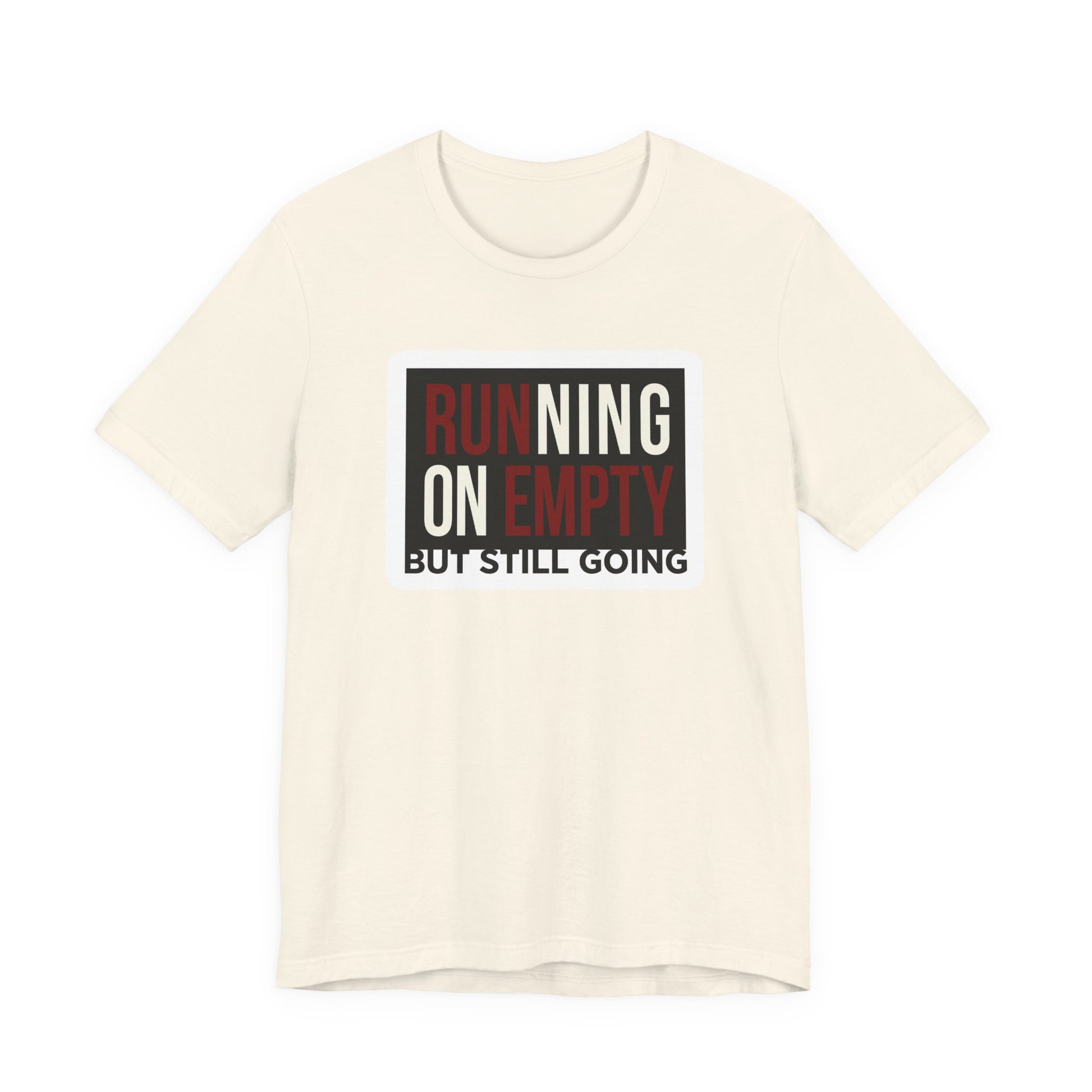 Natural Bella+Canvas 3001 unisex tee with Running on Empty But Still Going graphic, on hanger