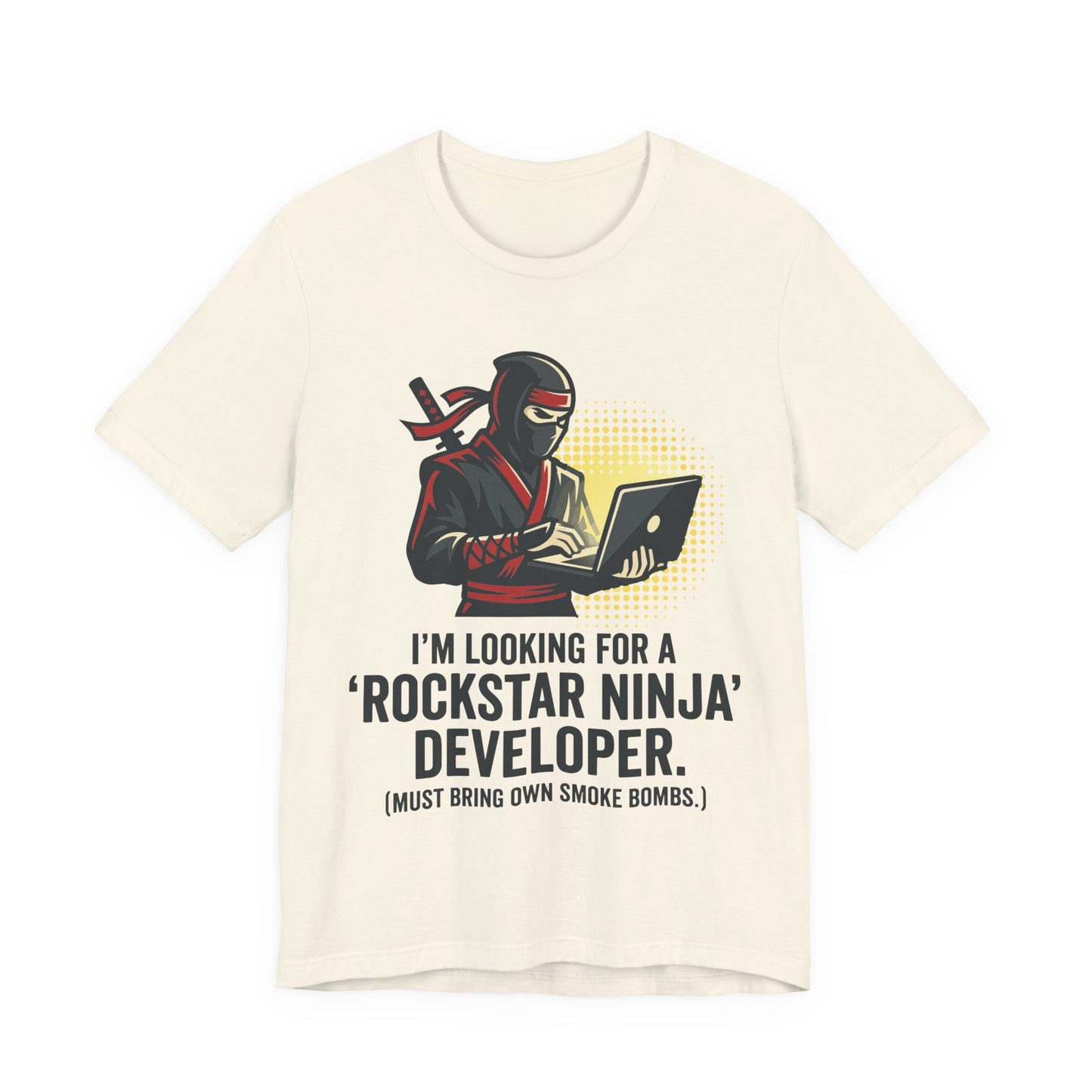 Natural Bella+Canvas 3001 unisex tee with Rockstar Ninja Developer graphic and text design, flat lay