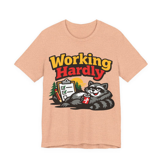 Black Bella+Canvas 3001 unisex tee with Working Hardly raccoon graphic, on hanger