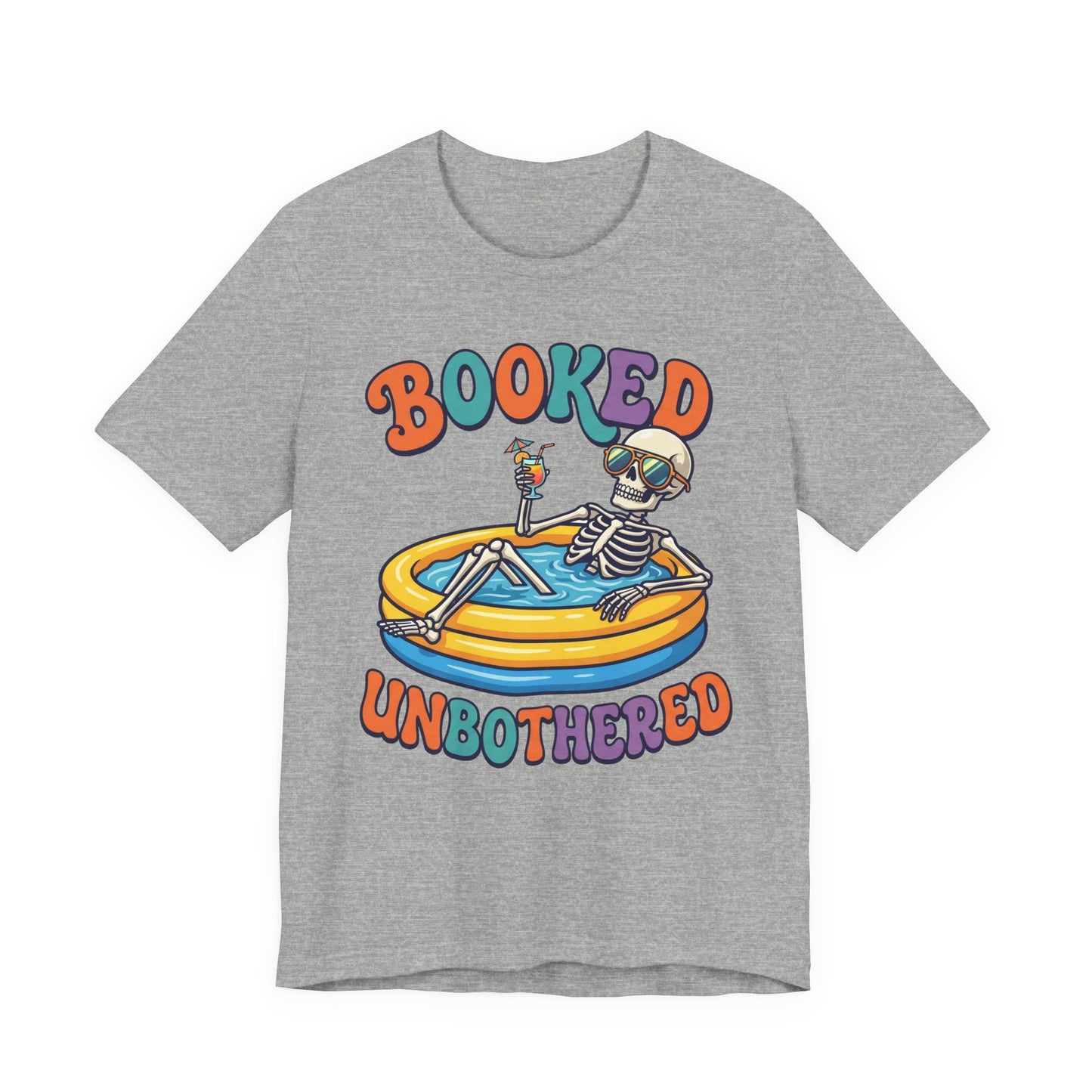 Natural Bella+Canvas 3001 unisex tee with Booked and Unbothered graphic, flat lay