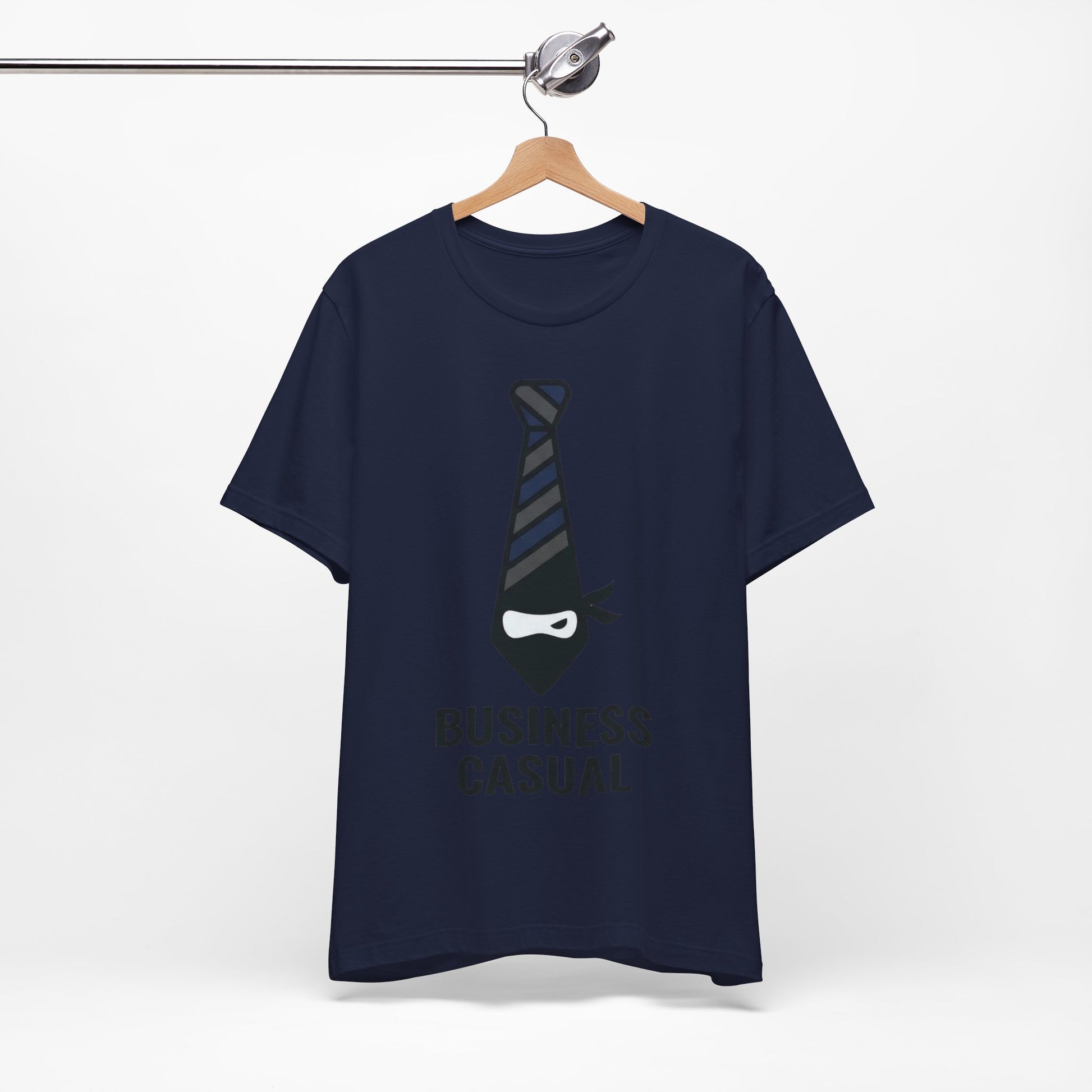 Navy Bella+Canvas 3001 unisex tee with Business Casual ninja in tie graphic, on hanger