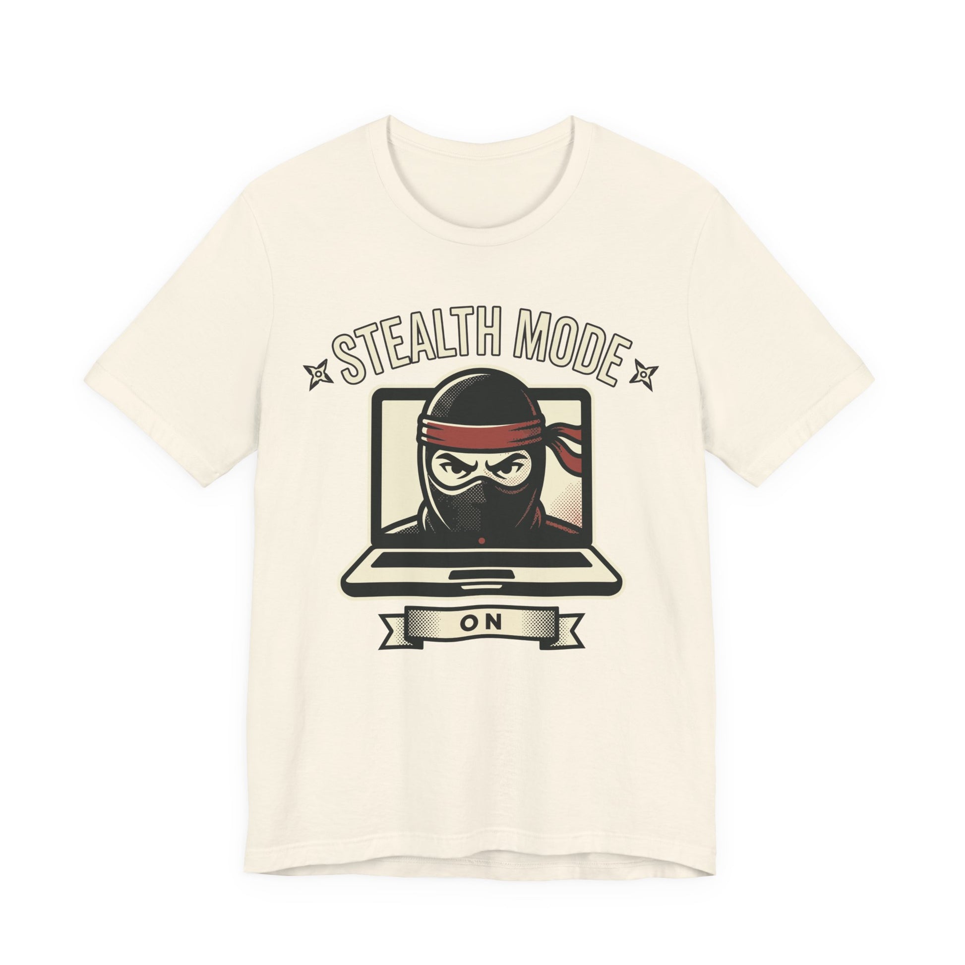 Natural Bella+Canvas 3001 unisex tee with Stealth Mode On ninja laptop graphic, on hanger