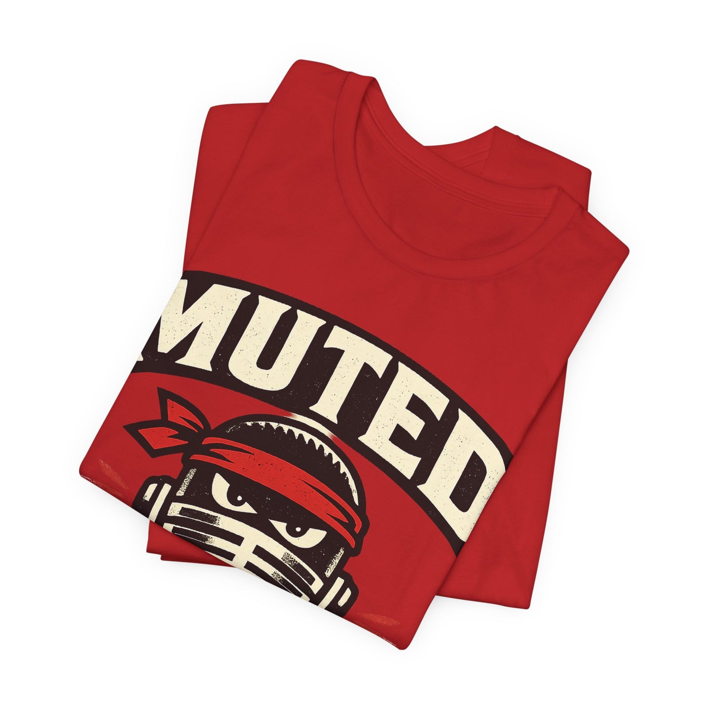 Red Bella+Canvas 3001 unisex tee with Muted But Dangerous ninja graphic, flat lay