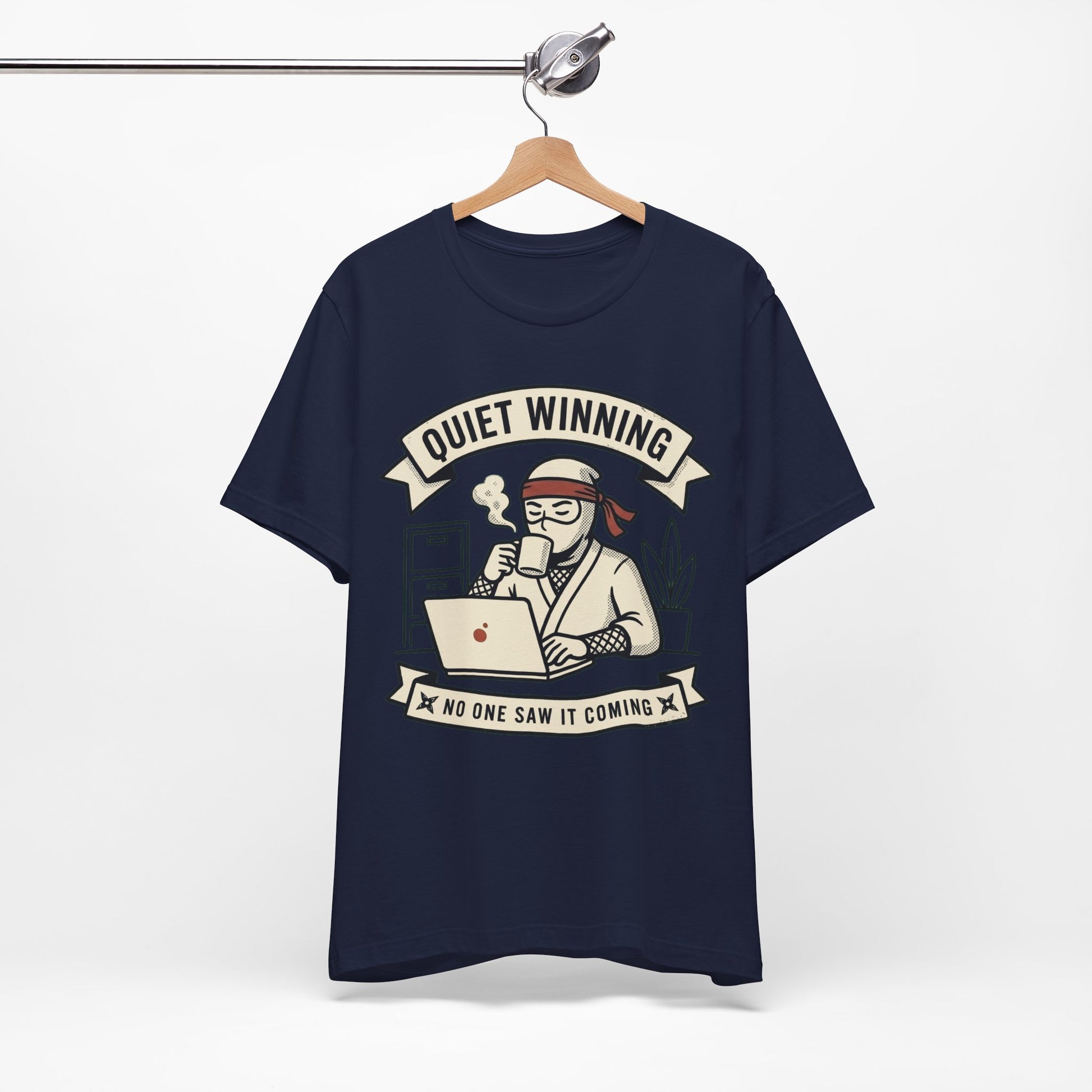 Steel Blue Bella+Canvas 3001 unisex tee with Quiet Winning ninja laptop design, flat lay
