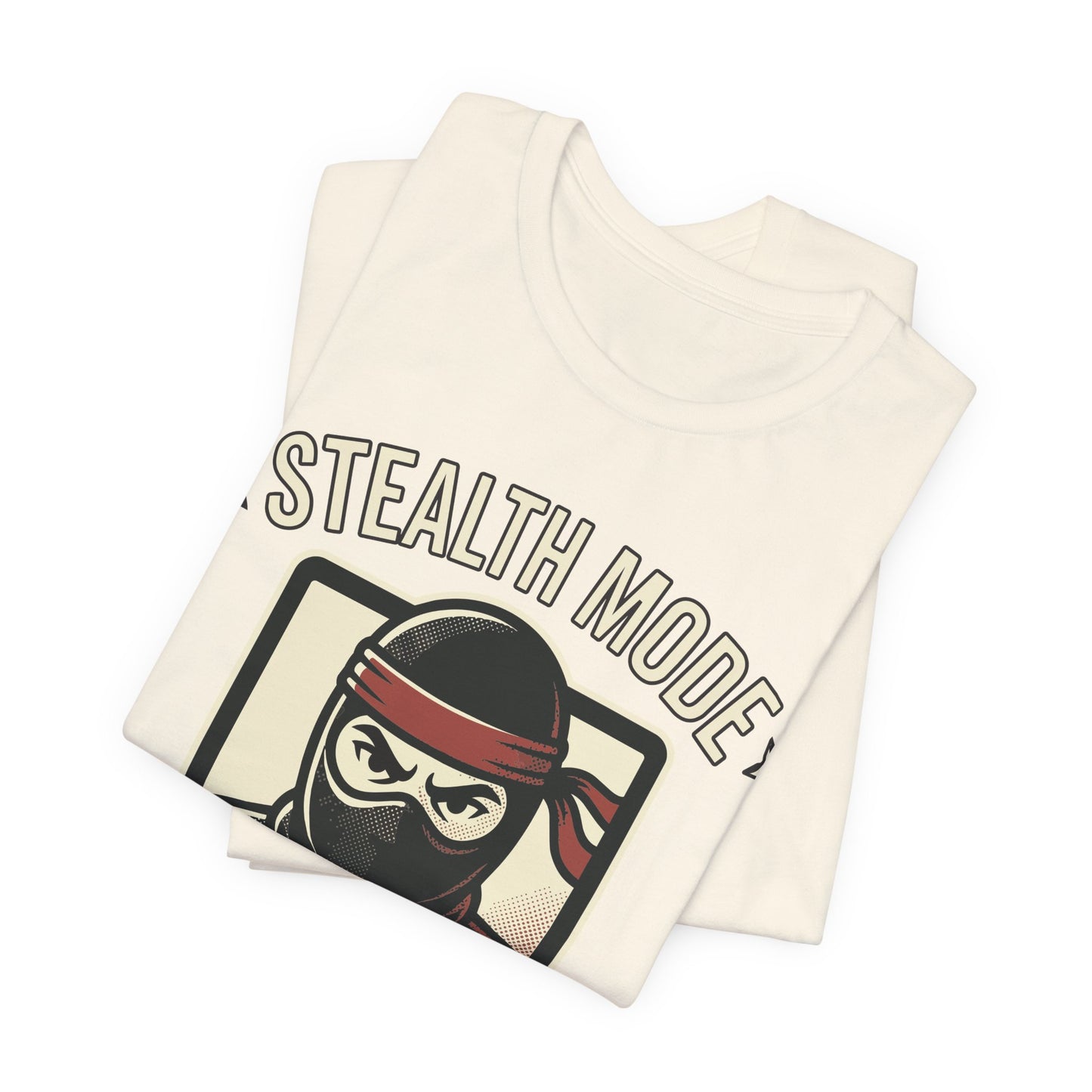 Navy Bella+Canvas 3001 unisex tee with Stealth Mode On ninja laptop graphic, flat lay