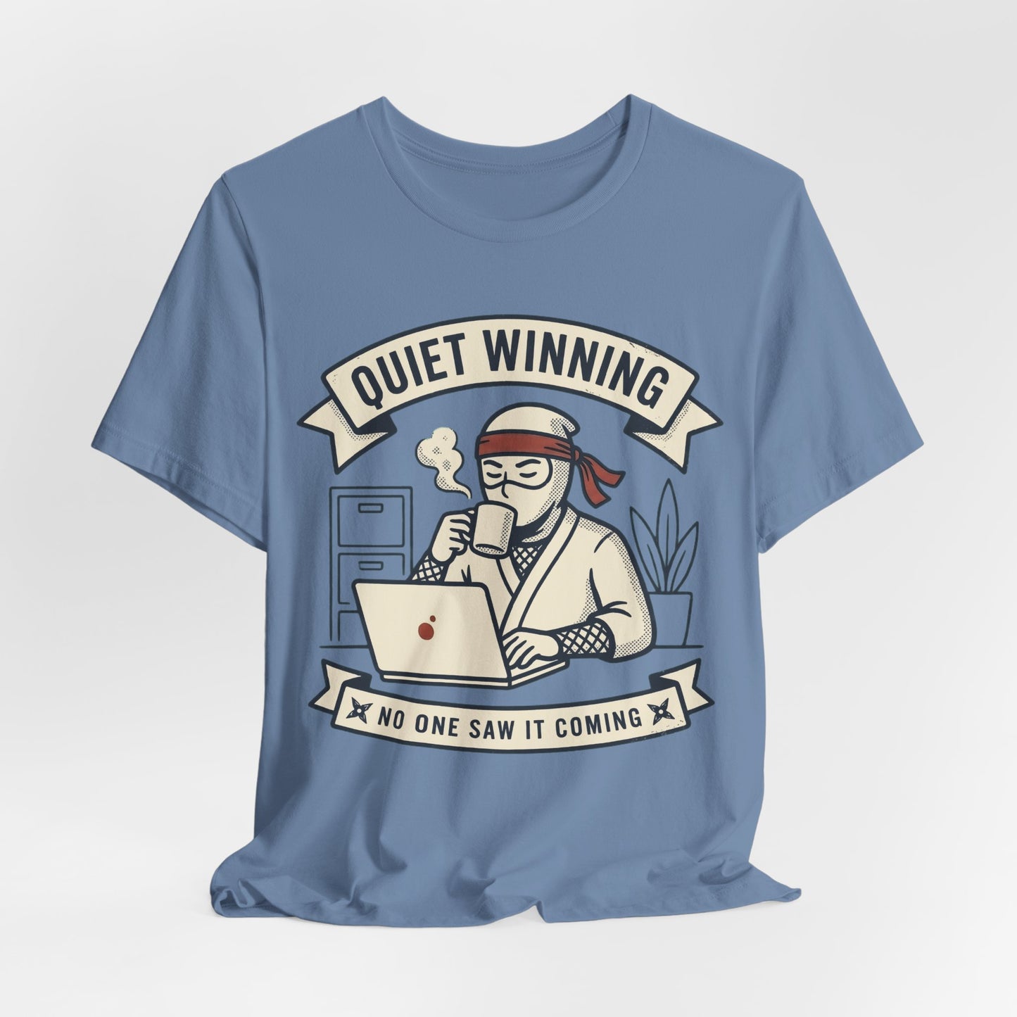 Black Bella+Canvas 3001 unisex tee with Quiet Winning ninja laptop design, on hanger