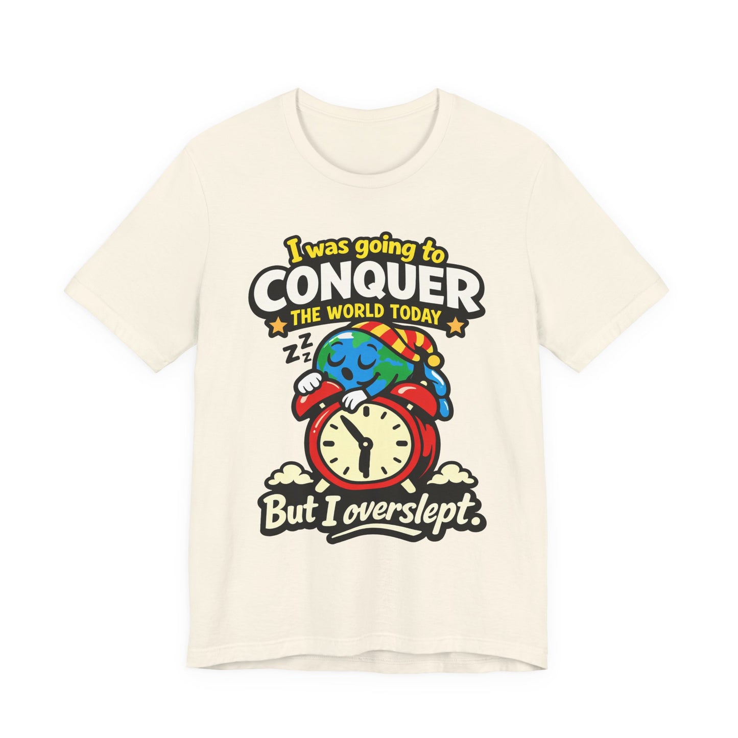 Natural Bella+Canvas 3001 unisex tee with I Was Going to Conquer the World But I Overslept graphic, on hanger