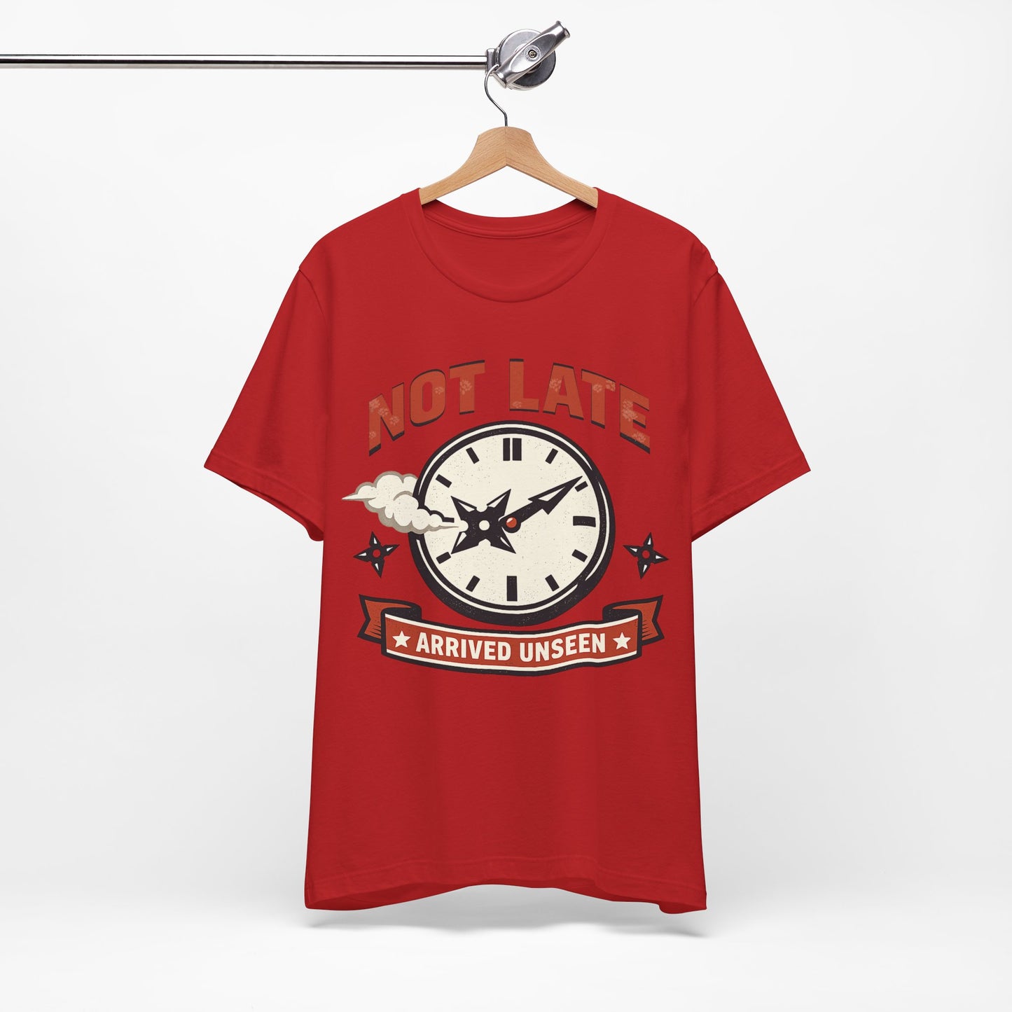 Natural Bella+Canvas 3001 unisex tee with Not Late Arrived Unseen ninja clock design, on hanger