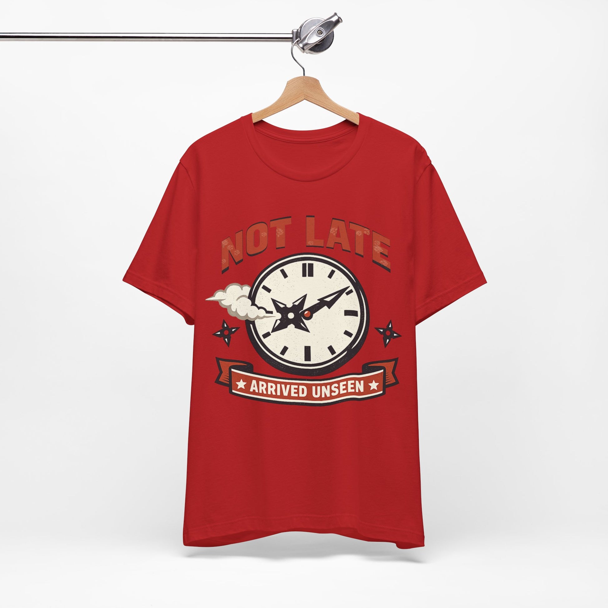 Natural Bella+Canvas 3001 unisex tee with Not Late Arrived Unseen ninja clock design, on hanger