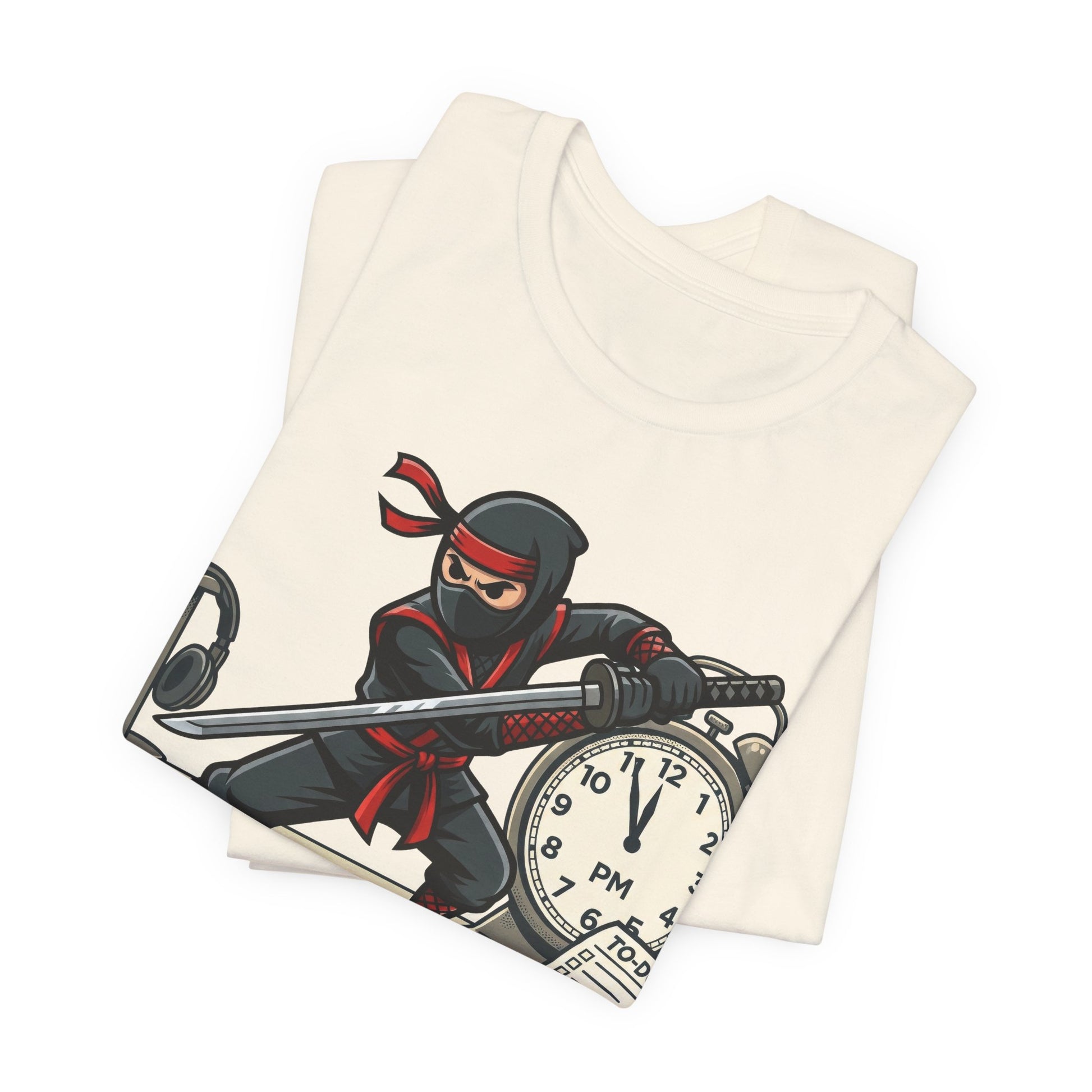 Natural Bella+Canvas 3001 unisex tee with I'm Not Procrastinating ninja and clock graphic, flat lay