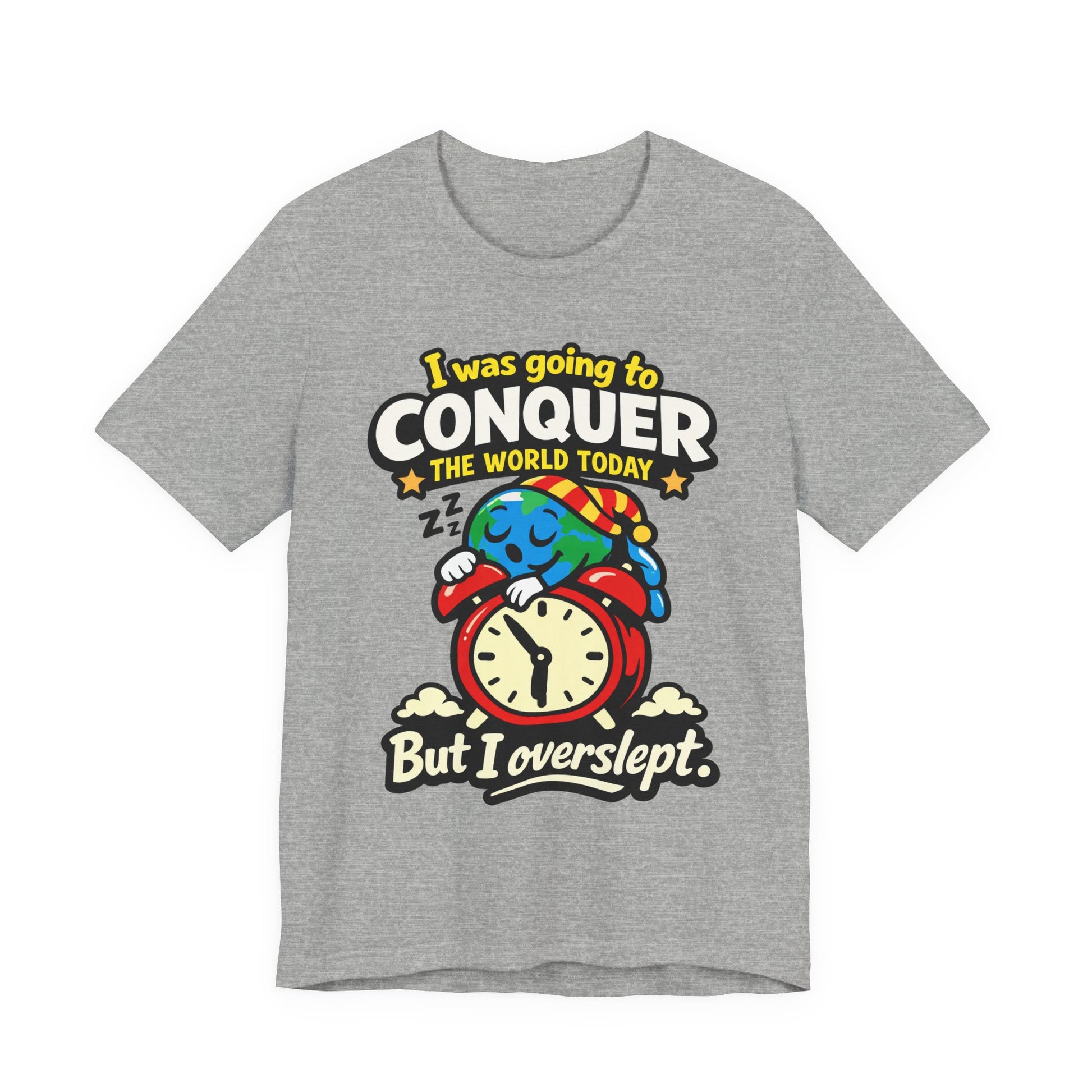 Natural Bella+Canvas 3001 unisex tee with I Was Going to Conquer the World But I Overslept graphic, flat lay