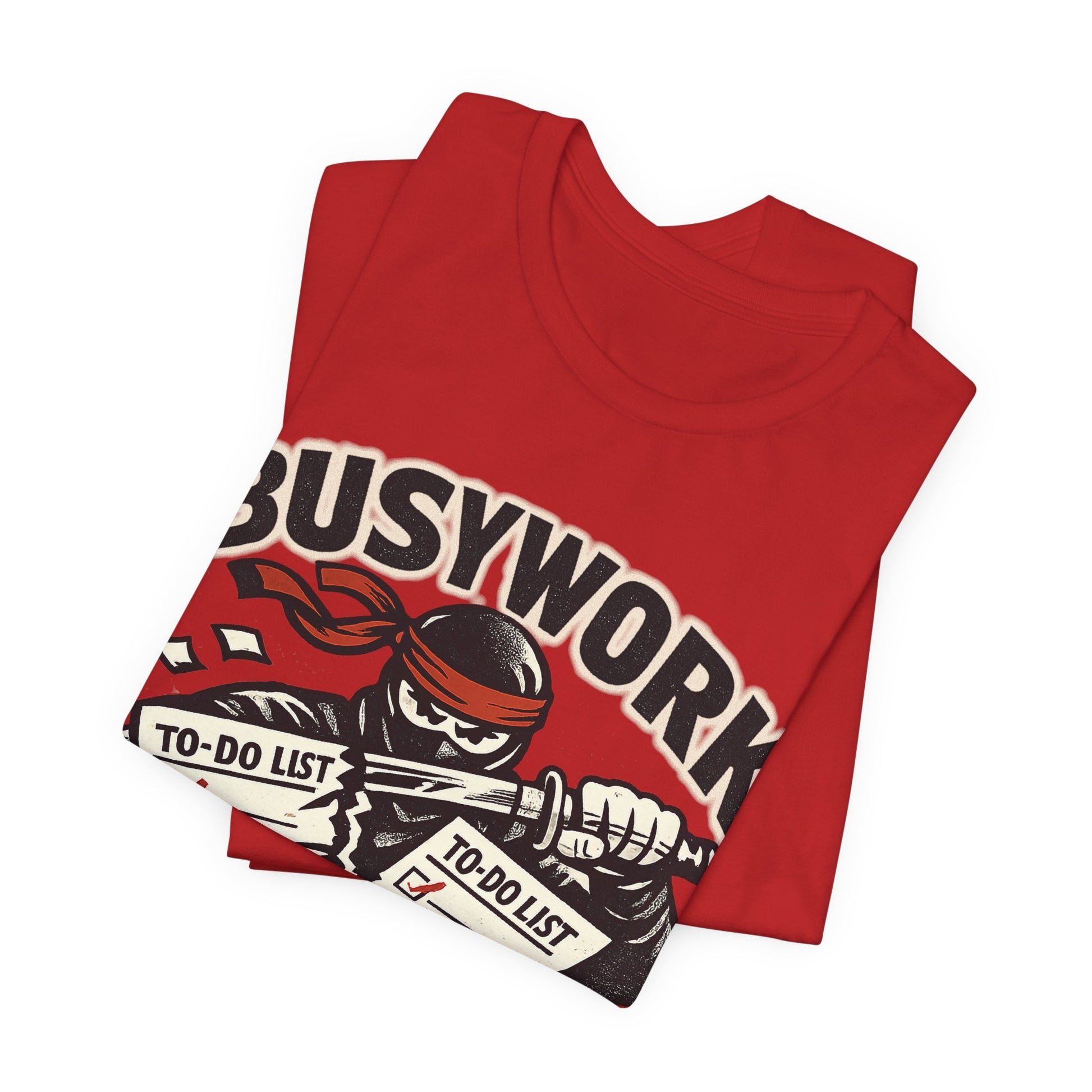 Red Bella+Canvas 3001 unisex tee with Busywork Sliced ninja slicing to-do lists graphic, flat lay