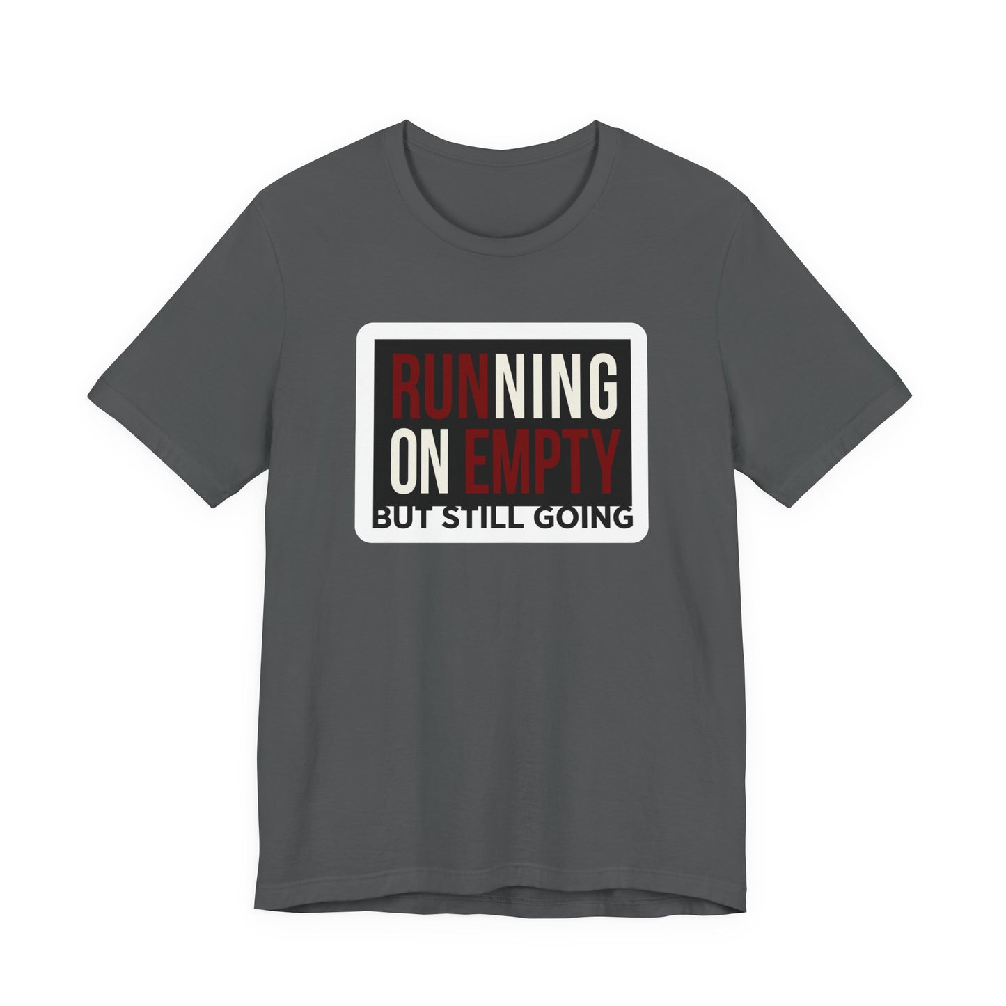 Red Bella+Canvas 3001 unisex tee with Running on Empty But Still Going graphic, on hanger