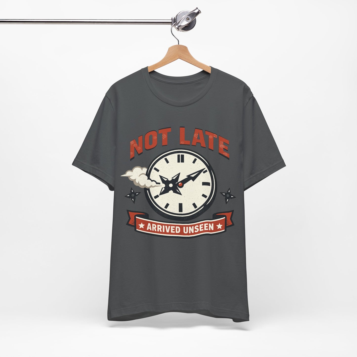 Red Bella+Canvas 3001 unisex tee with Not Late Arrived Unseen ninja clock design, flat lay