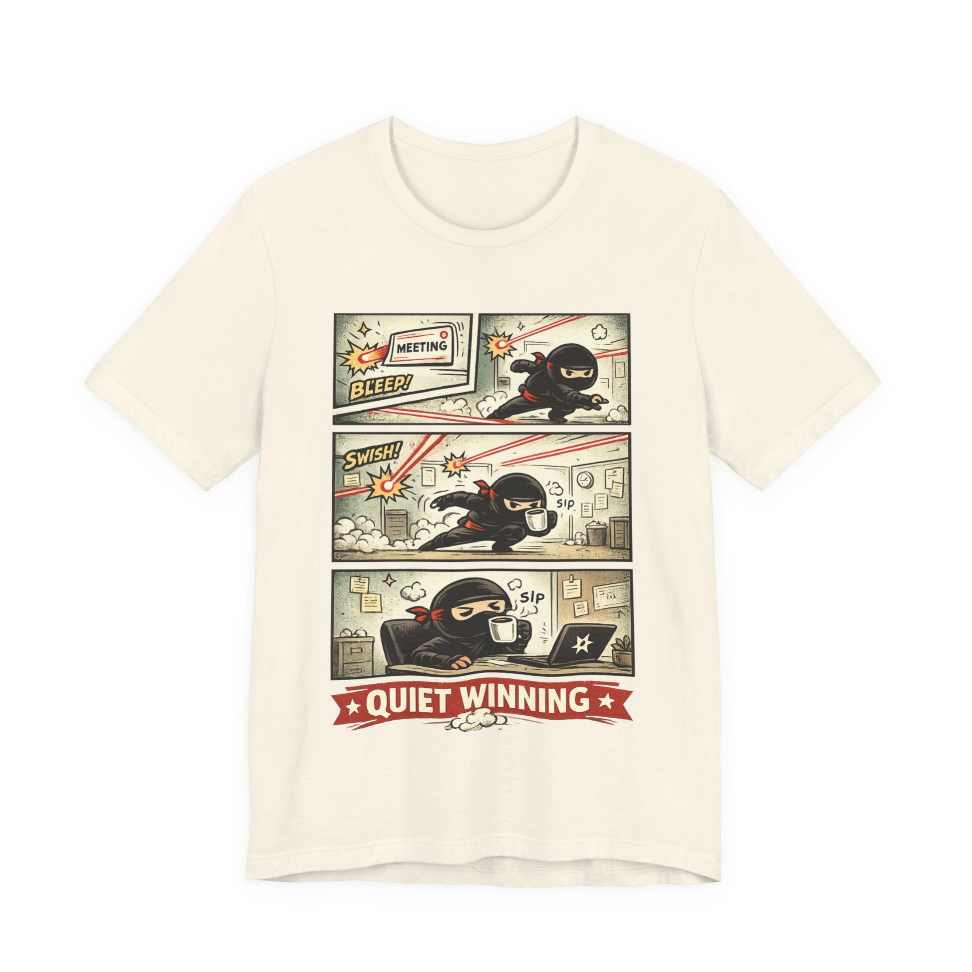 Natural Bella+Canvas 3001 unisex tee with Quiet Winning ninja comic strip graphic, flat lay