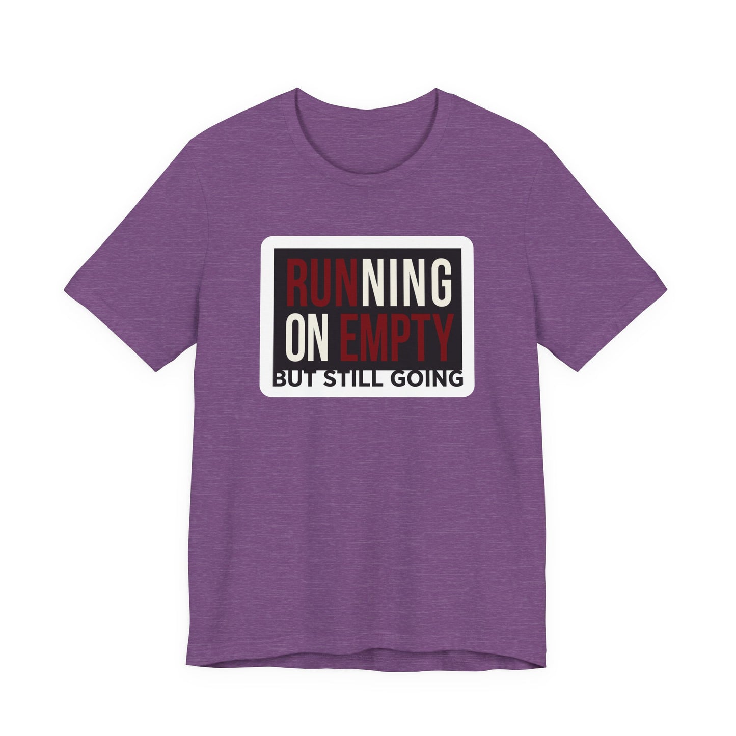 Red Bella+Canvas 3001 unisex tee with Running on Empty But Still Going graphic, flat lay