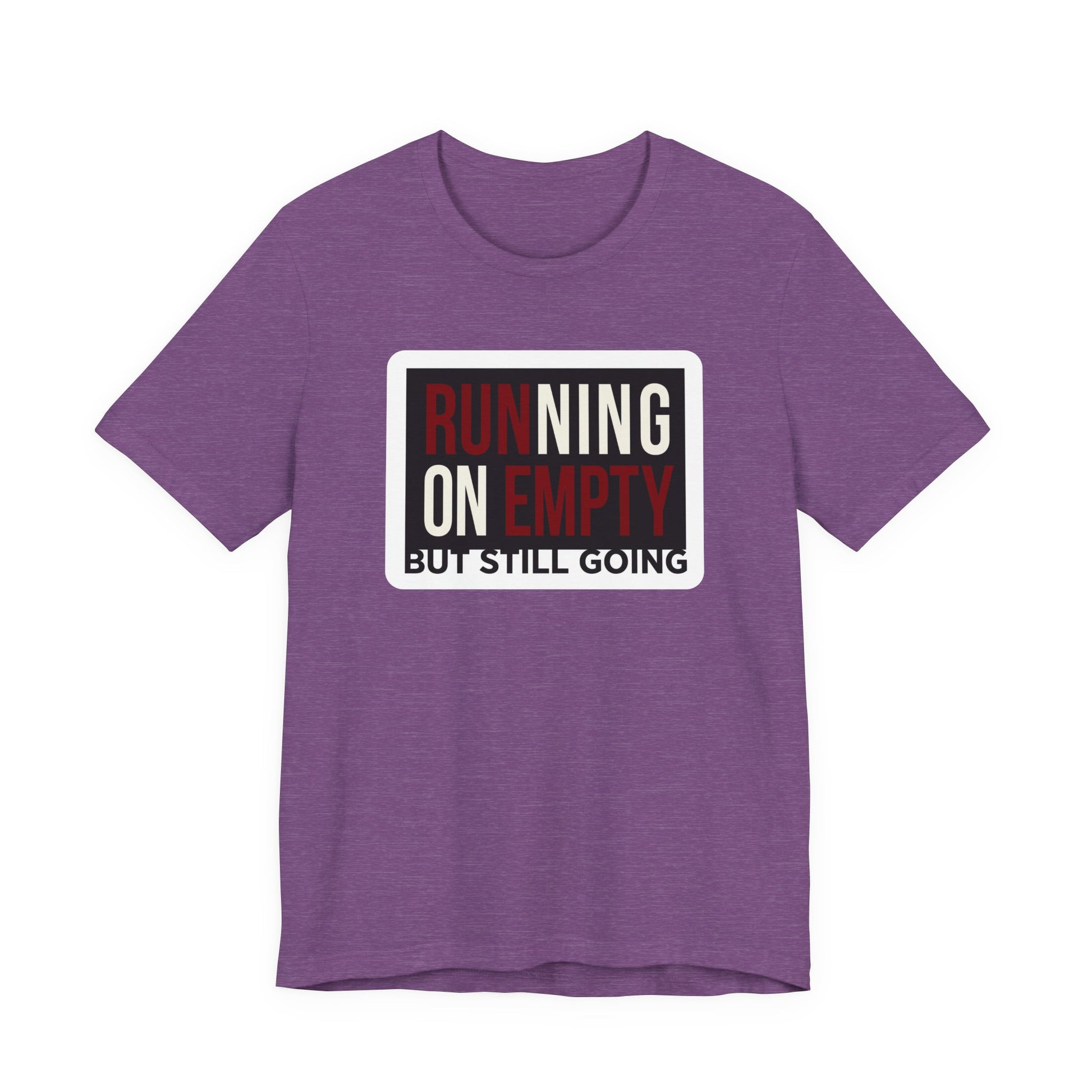 Red Bella+Canvas 3001 unisex tee with Running on Empty But Still Going graphic, flat lay
