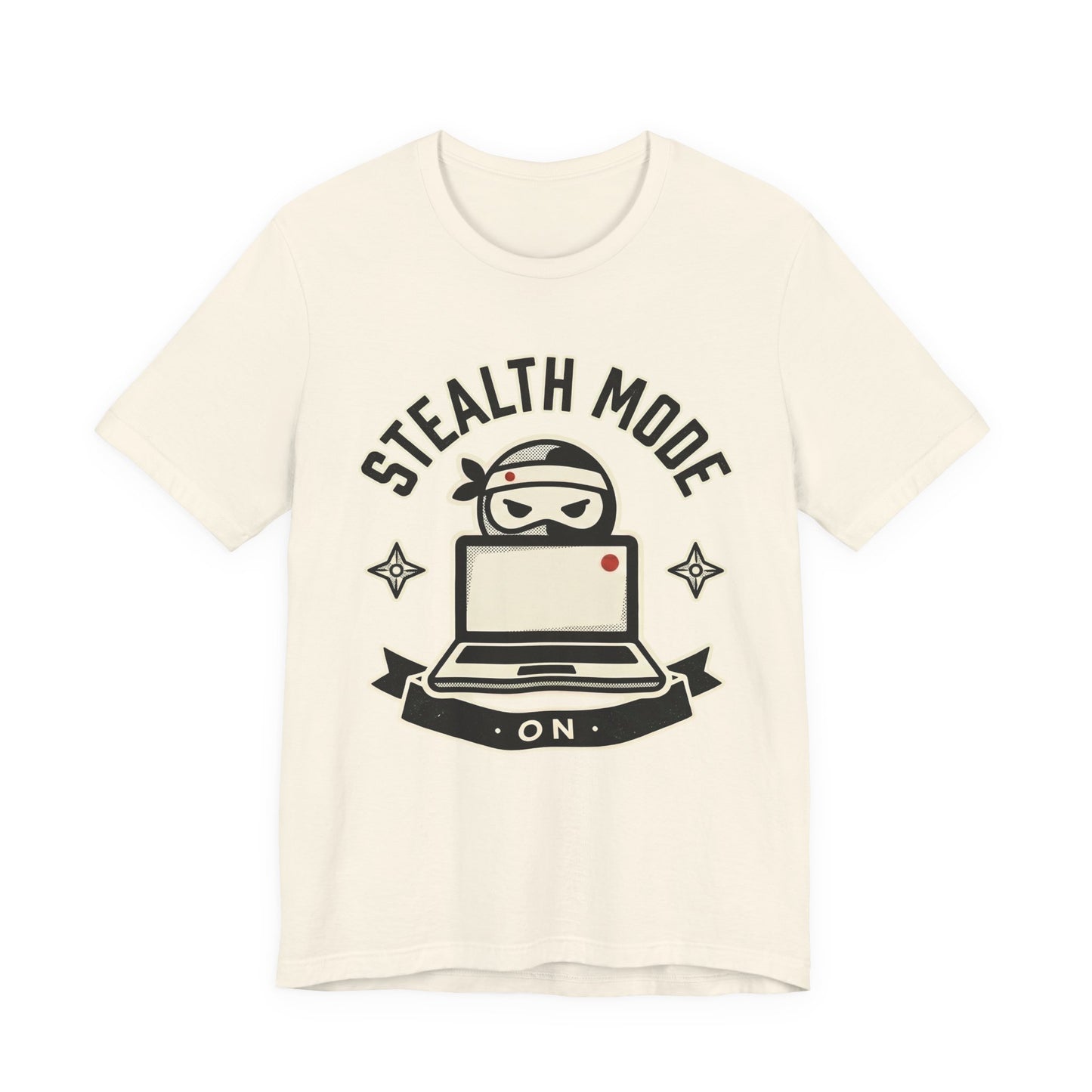 Natural Bella+Canvas 3001 unisex tee with Stealth Mode On ninja laptop badge graphic, flat lay