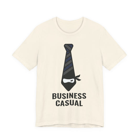 Natural Bella+Canvas 3001 unisex tee with Business Casual ninja in tie graphic, flat lay