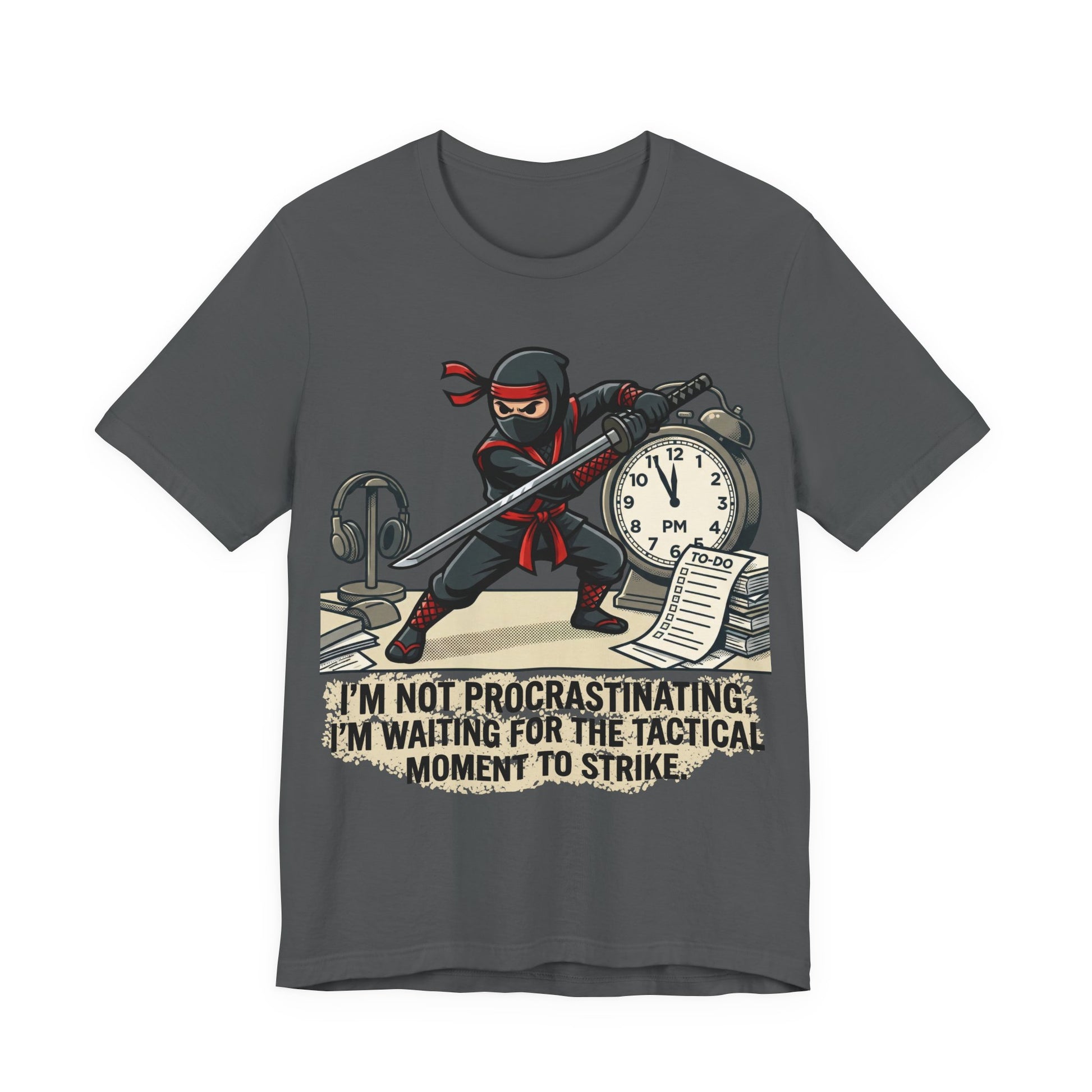 Asphalt Bella+Canvas 3001 unisex tee with I'm Not Procrastinating ninja and clock graphic, on hanger